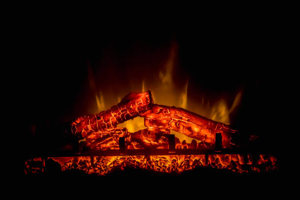 istock Electric fireplace with orange and yellow fire flame 1140080114