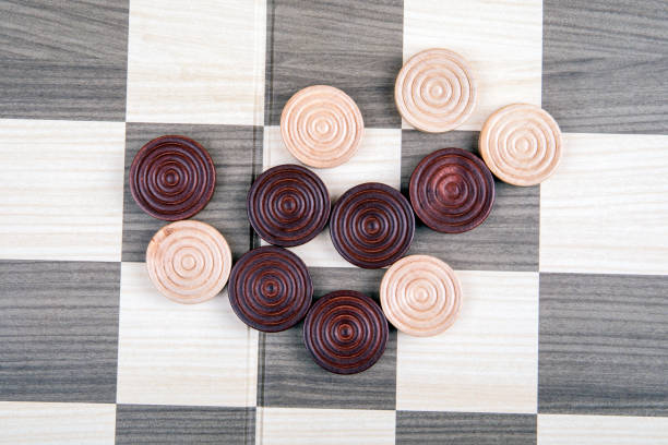 istock Wooden checkers dice on the playground 1140083482