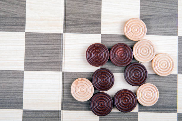 istock Wooden checkers dice on the playground 1140083488