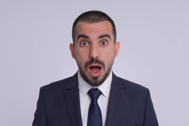 istock Portrait of happy surprised man 1140091462