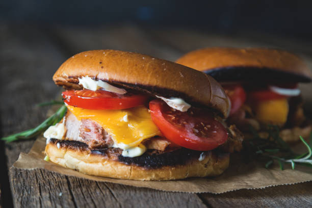 istock Cheeseburger with chopped meat, cheese and vegetables 1140093033