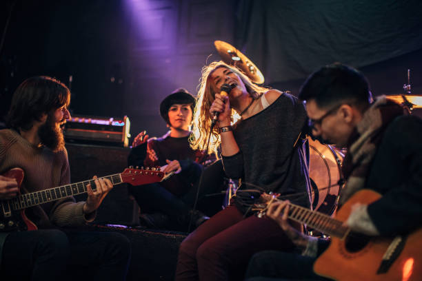 istock Band performing on stage in nightclub 1140096213