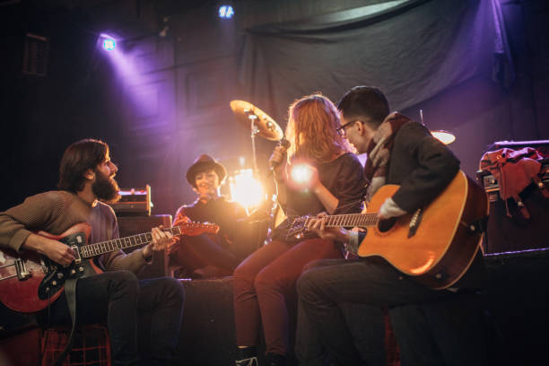 istock Music band performing in nightclub 1140096931
