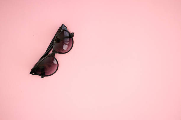 istock Woman accessories on pink background 1140097008