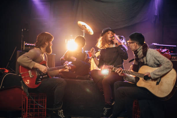 istock Music band having fun performing on stage 1140097318