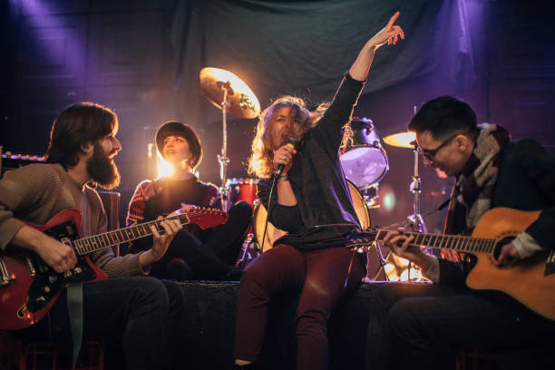 Music band having fun performing in nightclub