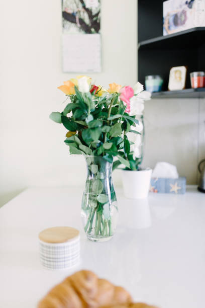 istock Beautiful pink peony flowers on white table with copy space for your text top view and flat lay style 1140098176