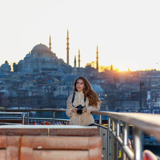 istock Photographer taking photos at sunset 1140104057