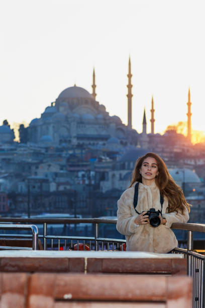 istock Photographer taking photos at sunset 1140104143