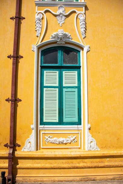 istock Classic retro and vintage yellow building 1140104451