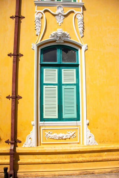 istock Classic retro and vintage yellow building 1140104452