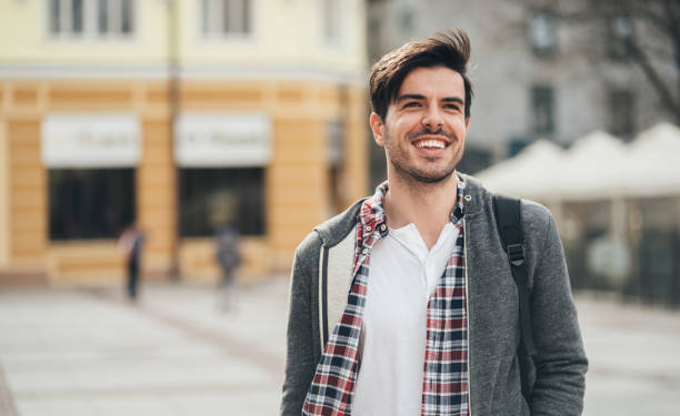 istock Portrait of smiling young man 1140104475
