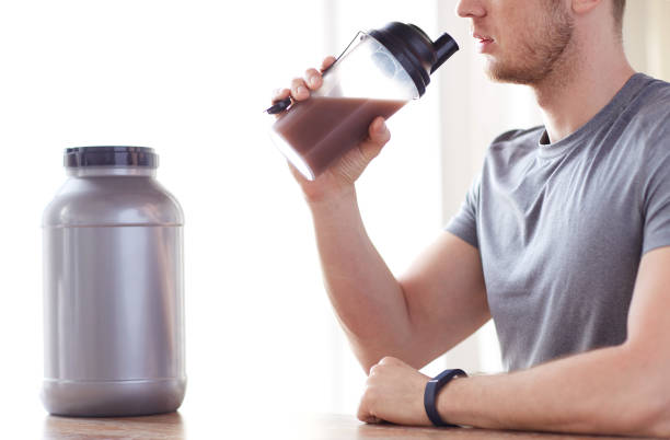 istock close up of man drinking protein shake 1140111167