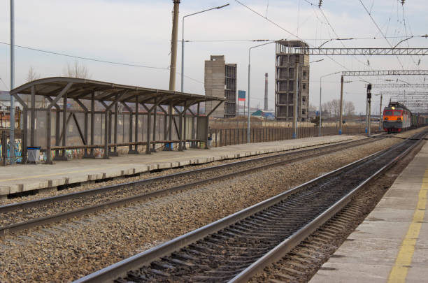 istock a passenger railway station and an approaching train 1140112678