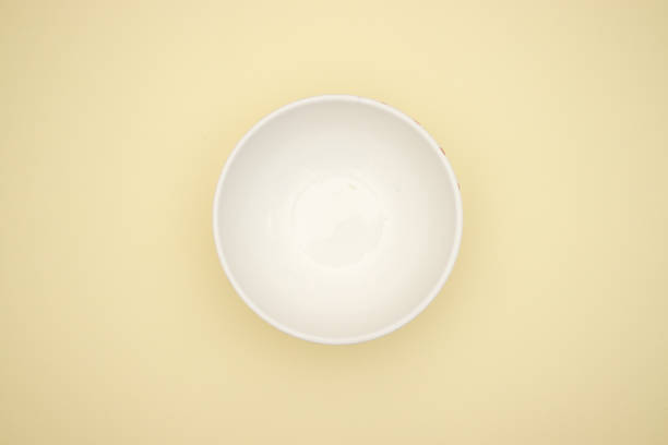 istock Pasta in white dish on yellow background 1140114096