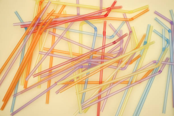 istock Plastic colorful tube on yellow background 1140114165