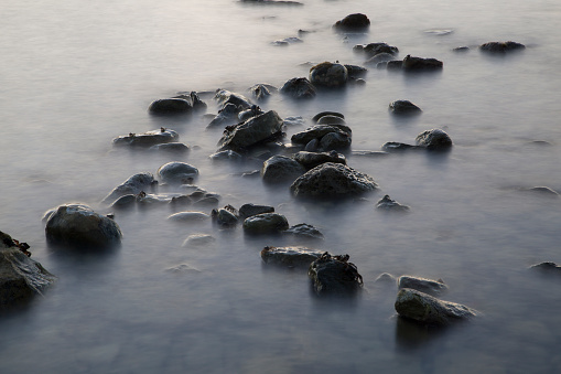 Long exposure stones and crabs