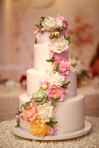Delicious wedding cake on table