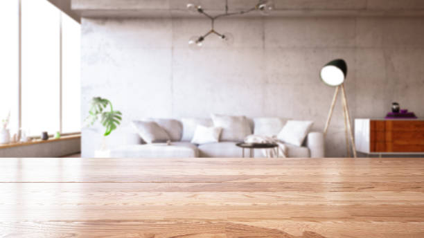 istock Table Top with Blur of modern Living Room interior 1140121707