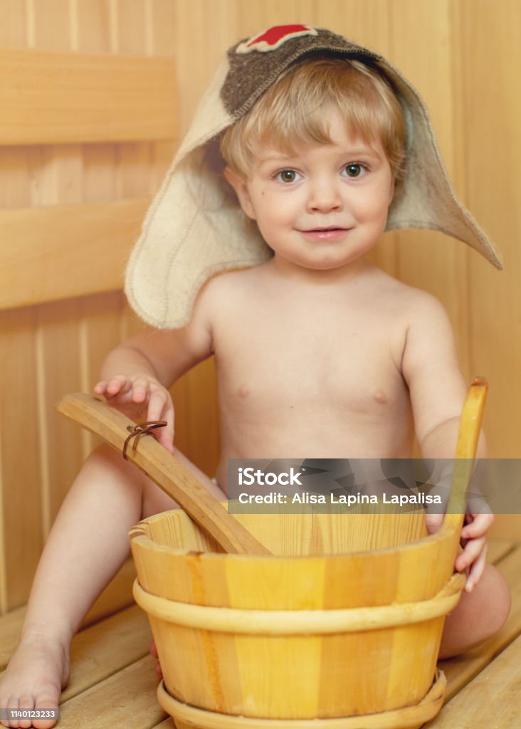 https://media.istockphoto.com/id/1140123233/photo/beauty-healthcare-baby-boy-relaxing-in-the-sauna-toddler-with-broom-and-hat-in-russian-sauna.jpg?s=1024x1024&w=is&k=20&c=MdaqjpJM49wswE-HSL7WGVLrhSTUnIC_GIe7Ucm_olw=