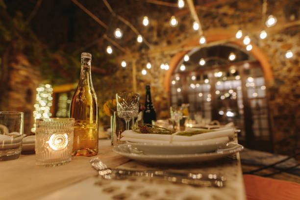istock Beautiful table setting for a big party in the night 1140124262
