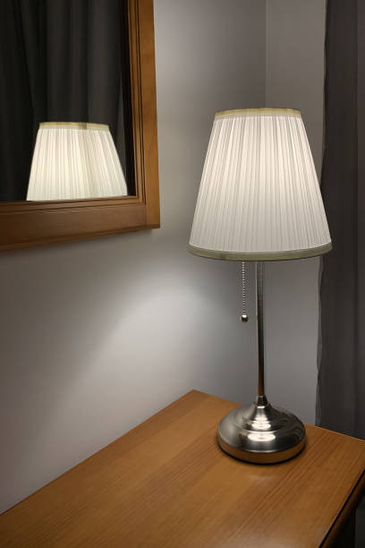 istock table lamp with lampshade on a wooden table 1140125000