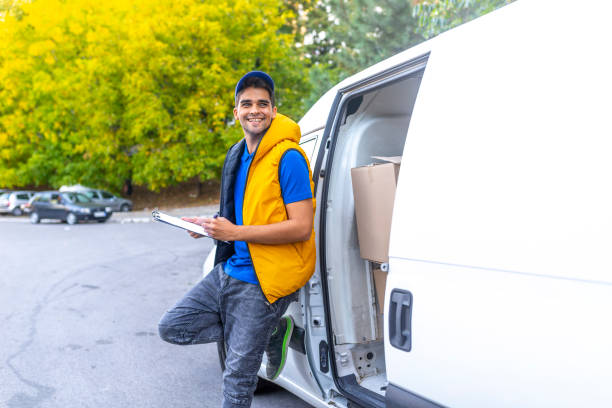 delivery postman. - postal worker truck driver delivering delivery person imagens e fotografias de stock