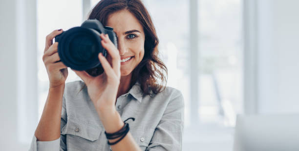 istock Professional photographer taking photos 1140126757