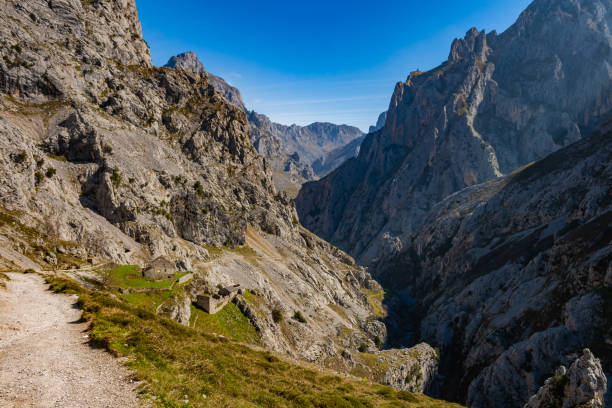 istock Route Cares River Gorge (Cain-Poncebos). Narrow and impressive canyon between cliffs, bridges, caves, footpaths and rocky mountains. Perfect place for hiking. Picos de Europa, Leon and Asturias, Spain 1140126816