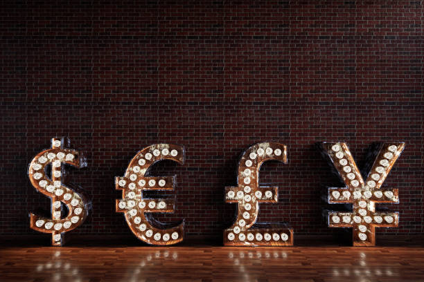 istock Light Bulb Currency Signs. Dollar Euro Pound Yen 1140127078