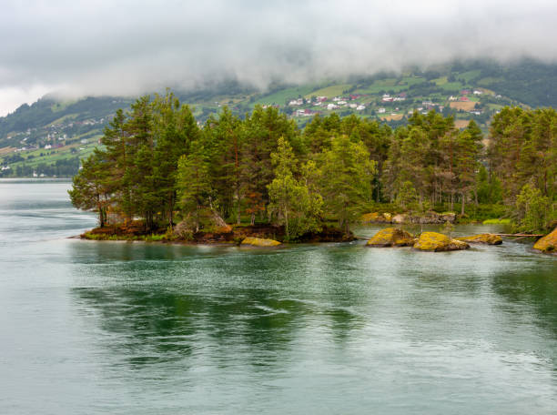 istock Summer cloudy fjord landscape, Norway 1140128100