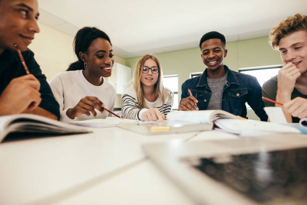istock Group of multiracial people studying together 1140128724