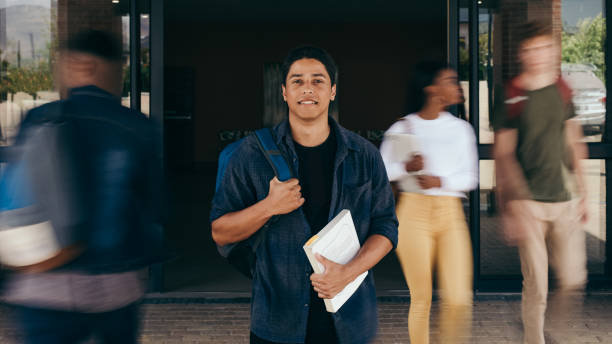 istock Male student at college campus 1140128748