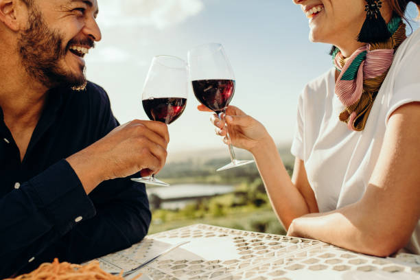 istock Smiling couple on a wine date 1140132238