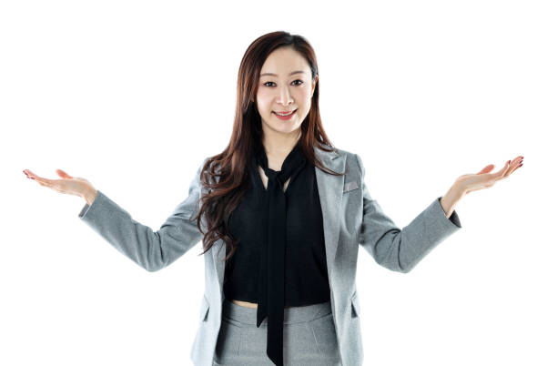 istock Smiling businesswoman open palms  on white background 1140134023