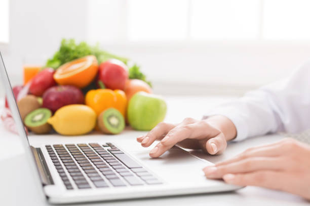 istock Doctor working with laptop at modern office 1140134141