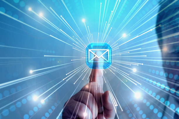 A Man touches on the Screen Icon for eMail