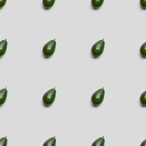 collage of avocados on grey background, seamless background pattern
