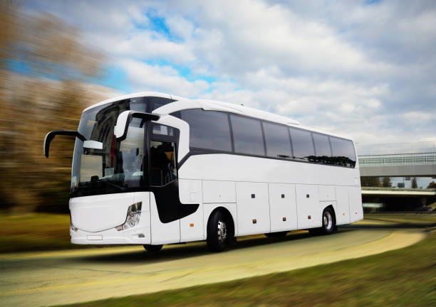 istock White Tour Bus on the Road 1140138866