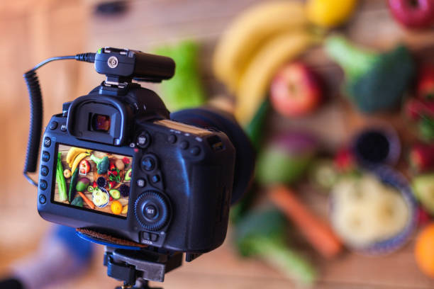 istock Fruit and veggies assortment at wood table photographed by dslr camera 1140140423