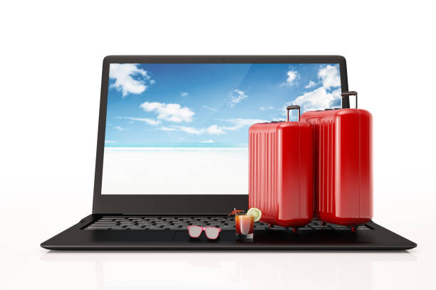 istock Online Booking Concept with Suitcases and Laptop 1140140558