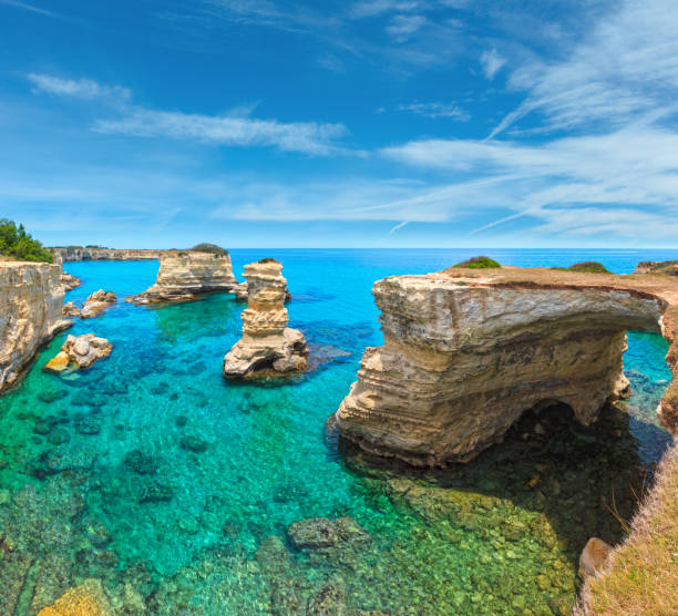 istock Faraglioni at Torre Sant Andrea, Italy 1140141363