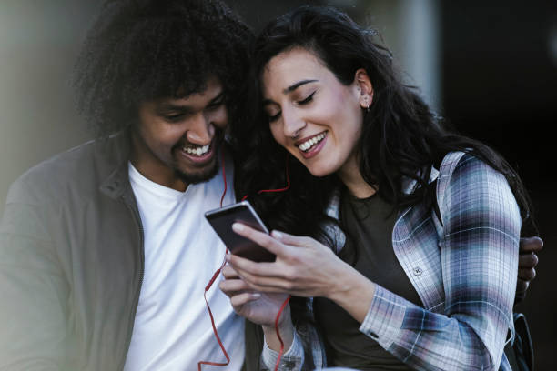 istock Beautiful young couple having fun outdoors on a lovely day 1140144377