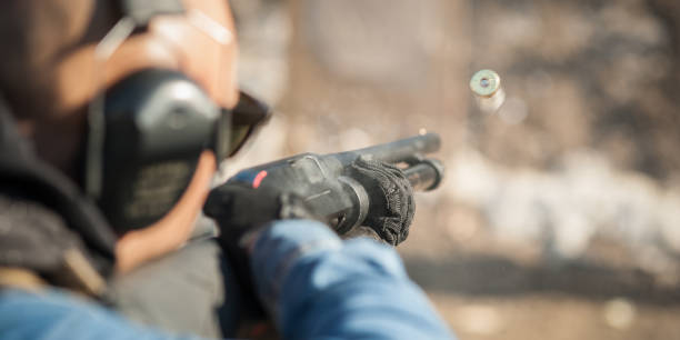 istock Tactical combat pump gun shooting training. Shotgun weapon action course 1140145539