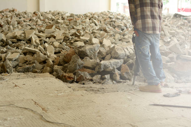 istock the  worker using dismantling machine hitting into the concrete  ground 1140145658
