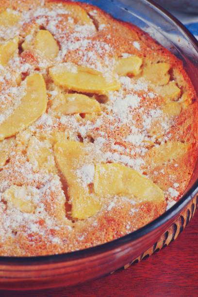 istock Apple pie charlotte with powdered sugar, top view. Rustic sweet food. 1140146947