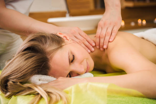 istock Woman enjoying classical neck and shoulder massage 1140148700