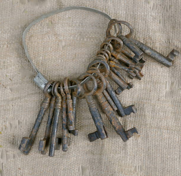 istock Key ring with some different old, rusty keys to sell at the flea market. 1140149384