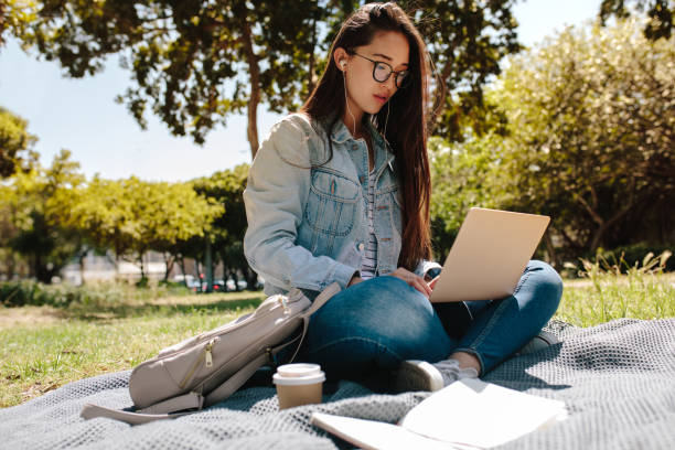 istock College student studying outdoors 1140149735