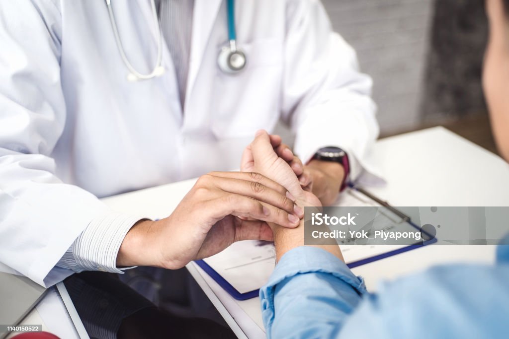 Doctor checking health primary of male patient for consultation health in hospital health. health and doctor concept. Primary Election Stock Photo